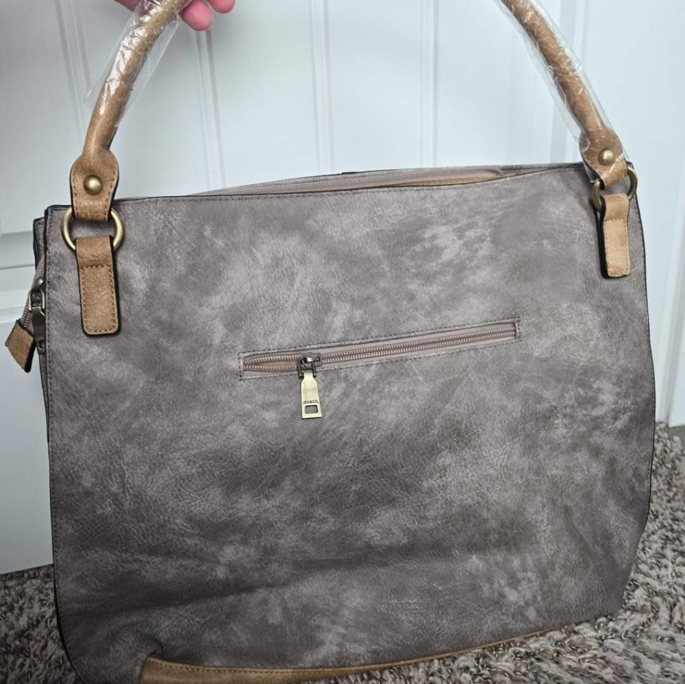 Gray marble shoulder purse.  Also comes with crossbody strap.  Brand new!!
